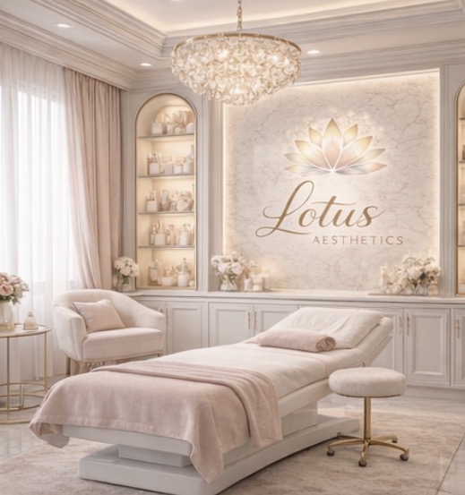 Lotus Aesthetics treatment room with blush palette and crystal chandelier